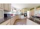 Spacious kitchen with stainless steel appliances, and tile backsplash at 2816 Shepard School Rd, Zebulon, NC 27597