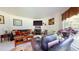 Cozy living room featuring fireplace, TV, and plush seating at 2816 Shepard School Rd, Zebulon, NC 27597