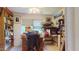 Office space with built-in bookshelves and natural light, offering a functional and organized workspace at 2816 Shepard School Rd, Zebulon, NC 27597