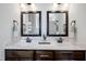 Bathroom featuring dual sinks with vanity, modern fixtures, and lots of counter space at 29 Laurel Ln, Youngsville, NC 27596