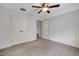Spacious carpeted bedroom with ceiling fan and double closets at 29 Laurel Ln, Youngsville, NC 27596