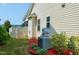 Exterior shot showing the side of the home with landscaping and an AC unit at 29 Laurel Ln, Youngsville, NC 27596
