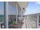 Private balcony with stylish seating and cityscape views from a high-rise building at 301 Fayetteville St # 2611, Raleigh, NC 27601