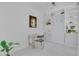 Bright bedroom features a murphy bed, built-in shelving, and modern white desk area at 301 Fayetteville St # 2611, Raleigh, NC 27601