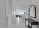 Hallway view of an open-concept condo with the kitchen and living room in view at 301 Fayetteville St # 2611, Raleigh, NC 27601
