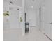 Hallway with built-in shelves and a murphy bed, and doors leading to other rooms at 301 Fayetteville St # 2611, Raleigh, NC 27601
