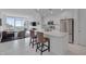 Modern kitchen with white cabinets, stainless appliances and granite counters at 301 Fayetteville St # 2611, Raleigh, NC 27601