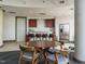 Kitchenette boasts stainless steel appliances, bar seating, and a dining area at 301 Fayetteville St # 2611, Raleigh, NC 27601