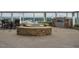 Rooftop terrace featuring a built-in stone grill and seating area with views at 301 Fayetteville St # 2611, Raleigh, NC 27601