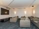 Relaxing entertainment theater room offering comfortable seating and large television at 301 Fayetteville St # 2611, Raleigh, NC 27601