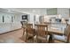 Open dining area leading to a modern kitchen and a cozy living room at 309 S Mckay Ave, Dunn, NC 28334