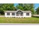 Charming one-story home with a landscaped front yard and lovely curb appeal at 309 S Mckay Ave, Dunn, NC 28334