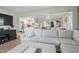 Open living space showing kitchen, dining room, and comfortable seating area at 309 S Mckay Ave, Dunn, NC 28334