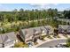 Overhead view of townhomes with tree-lined streets and convenient parking at 329 Castle Rock Ln, Cary, NC 27519