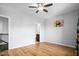 A bedroom boasting hardwood floors and a ceiling fan at 329 Castle Rock Ln, Cary, NC 27519