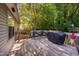 A cozy back deck with a grill and outdoor seating, perfect for entertaining and enjoying the outdoors at 358 Tillamook Dr, Wake Forest, NC 27587