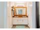 Bathroom with a wood-framed mirror and double sink vanity at 358 Tillamook Dr, Wake Forest, NC 27587