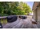 Wide shot of a large wooden deck featuring a grill and patio furniture at 358 Tillamook Dr, Wake Forest, NC 27587