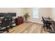 Home office with modern desk setups and wood floors at 358 Tillamook Dr, Wake Forest, NC 27587