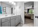 Bathroom featuring a sink with granite countertops, gray cabinets, tile floors, and view of the bedroom at 3587 Garner Terrace Way, Wake Forest, NC 27587