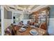 Dining room featuring a coffered ceiling and a beautiful wood table setting at 3587 Garner Terrace Way, Wake Forest, NC 27587