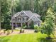 Beautiful exterior featuring a landscaped yard and craftsman style elements at 3587 Garner Terrace Way, Wake Forest, NC 27587