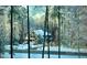 Charming home exterior featuring stone accents and a snowy landscape at 3587 Garner Terrace Way, Wake Forest, NC 27587