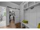 Functional mudroom with a sliding barn door, providing ample storage and style at 3587 Garner Terrace Way, Wake Forest, NC 27587