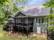 Expansive back porch and screened-in deck overlooking the wooded lot of this lovely home at 3587 Garner Terrace Way, Wake Forest, NC 27587