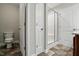 Bathroom featuring a toilet, vanity, shower, and doorways to other rooms at 39 Blue Heron Ct, Kenly, NC 27542