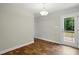 Dining room with hardwood floors and door to the deck at 39 Blue Heron Ct, Kenly, NC 27542