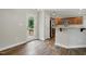 Dining room and kitchen with door to the deck at 39 Blue Heron Ct, Kenly, NC 27542