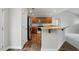 Well-appointed kitchen featuring stainless steel appliances and a breakfast bar at 39 Blue Heron Ct, Kenly, NC 27542