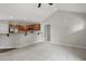 Bright living area featuring vaulted ceilings that connect to a kitchen with stainless steel appliances at 39 Blue Heron Ct, Kenly, NC 27542