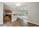 Open concept view of kitchen with breakfast bar and living room with fireplace at 39 Blue Heron Ct, Kenly, NC 27542