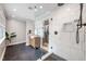 Open bathroom featuring a glass shower, rustic vanity, modern fixtures, sleek slate floors, and bright natural light at 3934 Hope Valley Rd, Durham, NC 27707