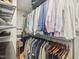 Custom walk-in closet with extensive storage and organization features with multiple racks and shelving at 3934 Hope Valley Rd, Durham, NC 27707