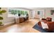 Spacious home office with large windows and comfortable seating at 3934 Hope Valley Rd, Durham, NC 27707