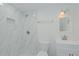 Bathroom featuring a modern shower with new tile at 408 N Maple St, Graham, NC 27253