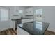 New kitchen with granite counters, stainless steel appliances, and white cabinetry at 408 N Maple St, Graham, NC 27253