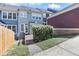 Charming backyard with a wooden deck and a blooming flower bush at 412 Heritage Village Ln, Apex, NC 27502