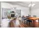 Spacious living room with a fireplace, hardwood floors, and modern furnishings at 412 Heritage Village Ln, Apex, NC 27502