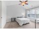 Bright bedroom with carpet, ceiling fan, and natural light from a window at 412 Heritage Village Ln, Apex, NC 27502