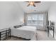 Bright bedroom with carpet, ceiling fan, and natural light from a window at 412 Heritage Village Ln, Apex, NC 27502