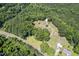 Beautiful aerial view of this home in a peaceful wooded and countryside setting at 4403 Jeffries Rd, Durham, NC 27704