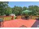 Relax on this home's beautiful wood deck that includes outdoor seating and table at 4403 Jeffries Rd, Durham, NC 27704