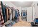 Walk-in closet with ample hanging space and shelving for organized storage solutions at 4403 Jeffries Rd, Durham, NC 27704