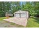 Detached two-car garage featuring two bays and a large concrete pad at 4403 Jeffries Rd, Durham, NC 27704