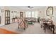 Inviting living room with a cozy seating arrangement, complemented by a ceiling fan and natural light filtering through the windows at 4403 Jeffries Rd, Durham, NC 27704