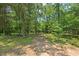 View of property with trees and lots of space at 4403 Jeffries Rd, Durham, NC 27704